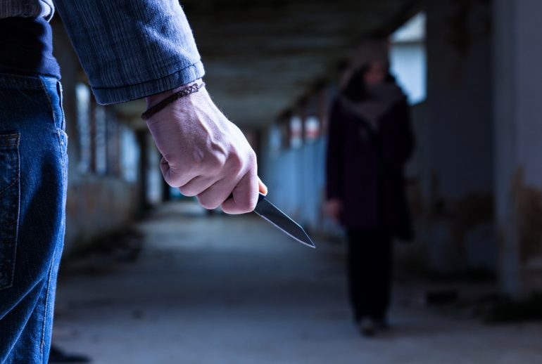 Criminal with Knife Waiting for a Woman