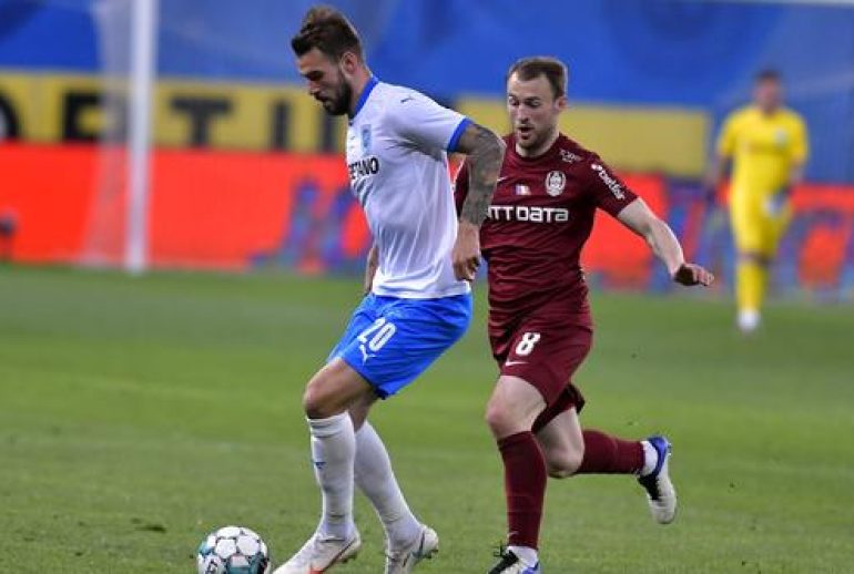 Alexandru Tudorie si Runar Mar S Sigurjonsson in meciul de fotbal dintre Universitatea Craiova si CFR Cluj, contand pentru Liga 1 Casa Pariurilor, desfasurat fara spectatori pe Stadionul Ion Oblemenco din Craiova, duminica 11 aprilie 2021. © FOTO:Razvan Pasarica/SPORT PICTURES