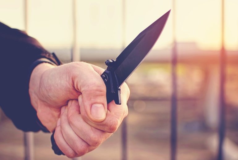 Hand with knife